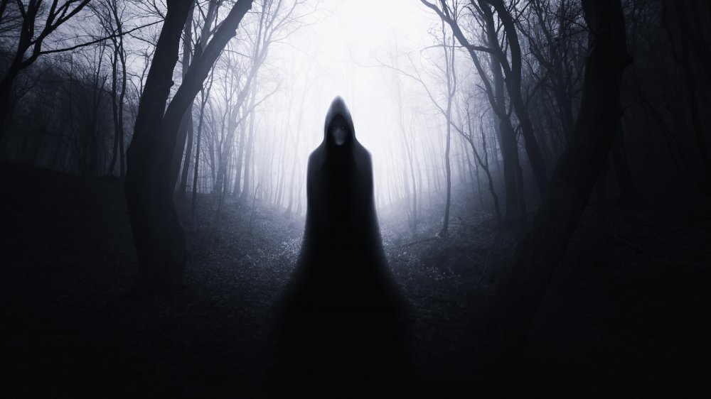 Ghastly cloaked figure in the shadows
