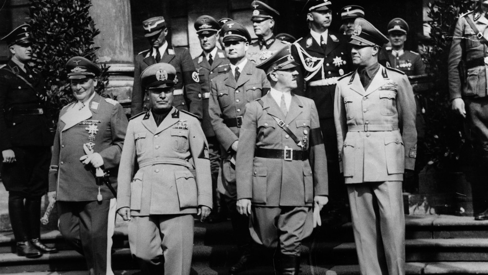 1932: German politician Rudolf Hess (second row, centre) at a meeting of leaders of the Axis powers in Germany (front row, left to right) Hermann Goering, Benito Mussolini, Adolf Hitler and Count Galeazzo Ciano. 