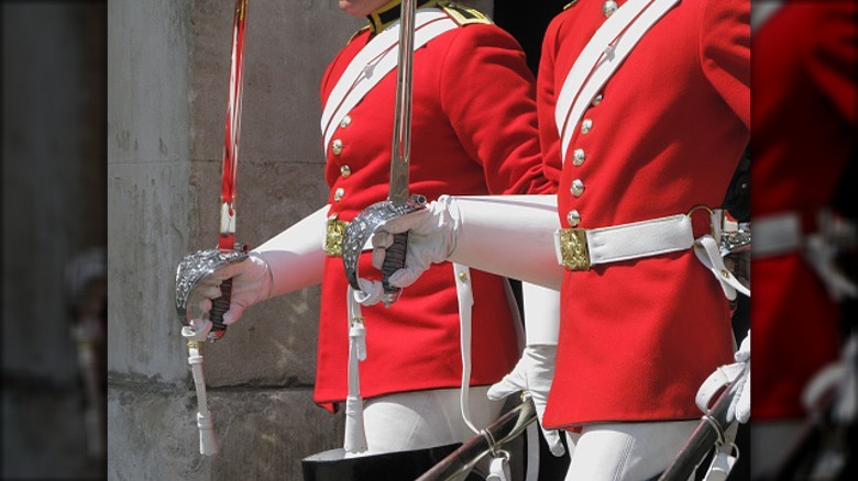 british military guard uniforms and swords