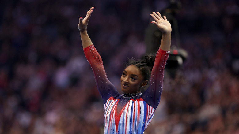 simone biles waving