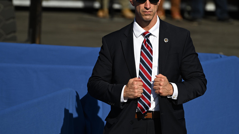 secret service agent standing outside