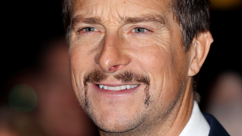 Bear Grylls in tuxedo with mustache