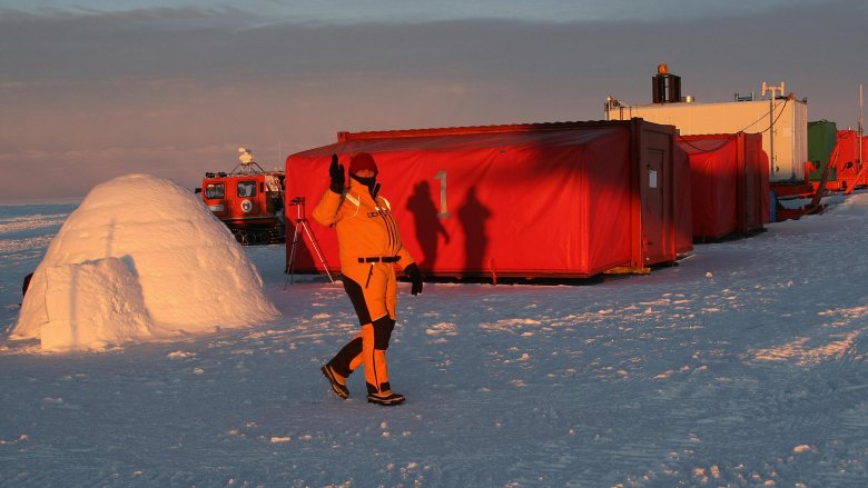 Antarctica, igloo toilet, man