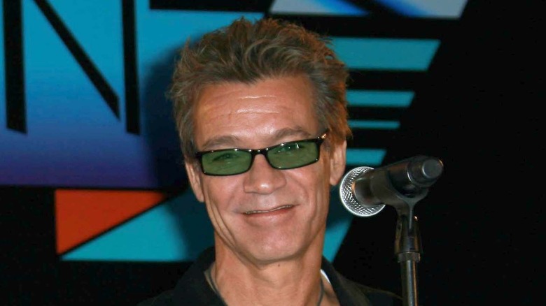 Eddie Van Halen smiling sunglasses at event