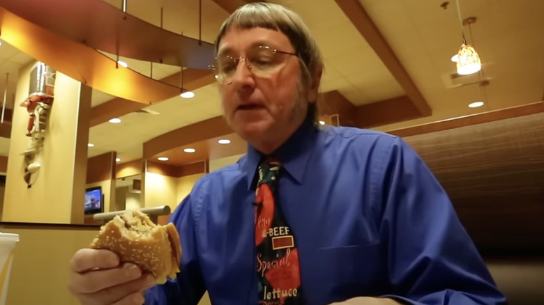 don gorske holding a half eaten big mac