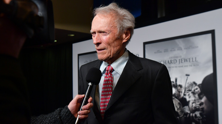 Clint Eastwood speaking to reporter