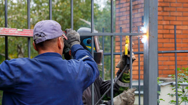 Fence worker