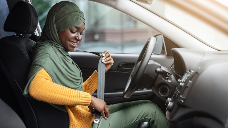 Fastening a seatbelt