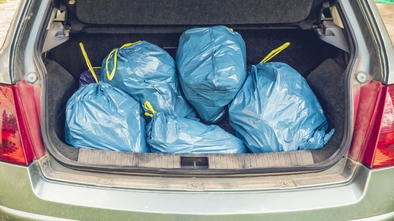 trash bags in car trunk