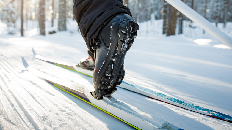 Skiier skiing on snow