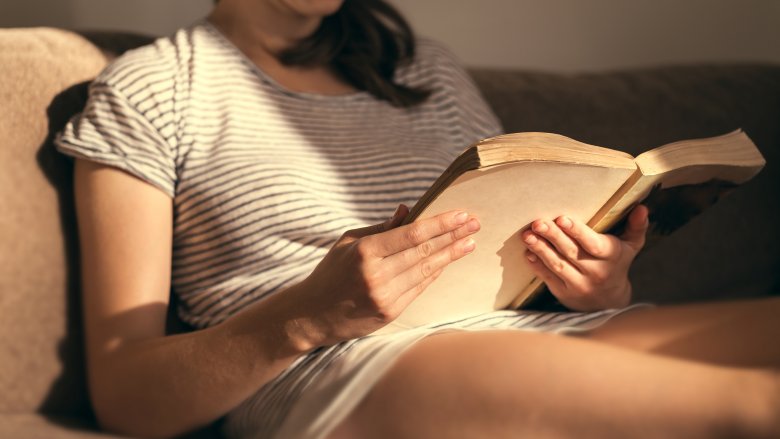 woman reading book