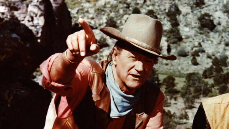 John Wayne pointing up