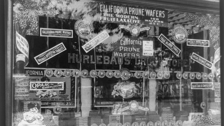 pharmacy window with advertisements