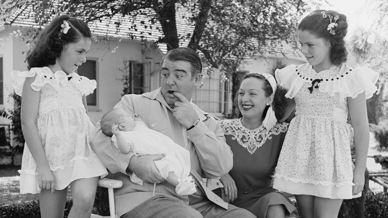 Costello entertains his family in garden