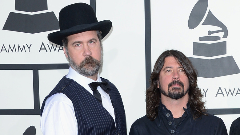 Krist Novoselic and Dave Grohl looking serious