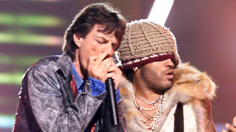 Mick Jagger and Lenny Kravitz at an awards ceremony