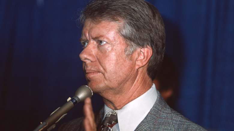 Jimmy Carter microphone hand