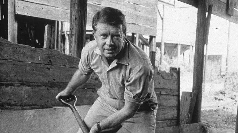 Jimmy Carter works on peanut farm