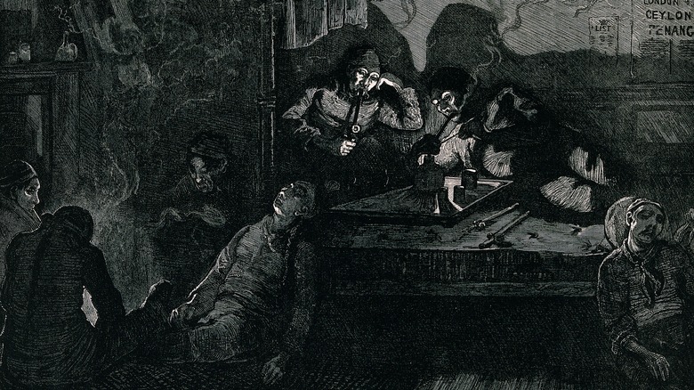 group smoking in opium den