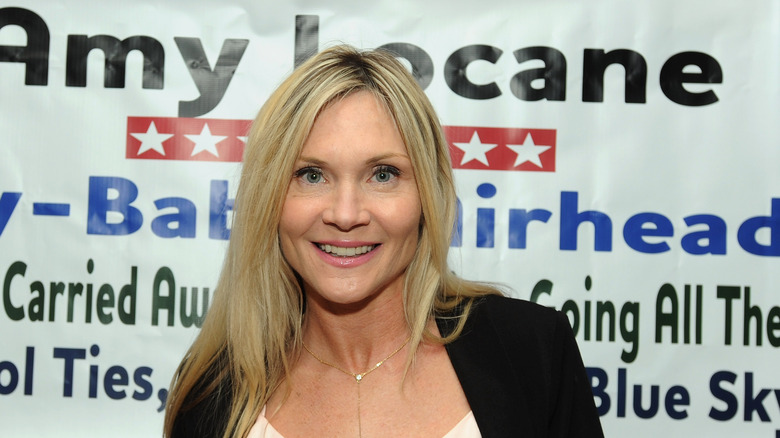 Amy Locane smiling 