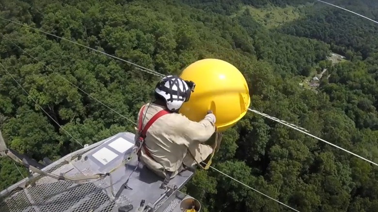 Power line ball helicopter installation