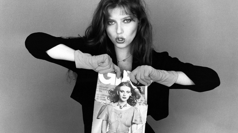 Bebe Buell photo shoot ripping a magazine