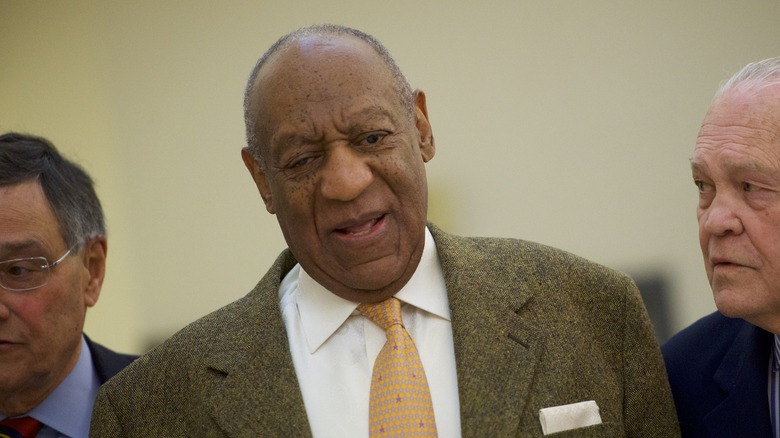 Bill Cosby in a suit and tie