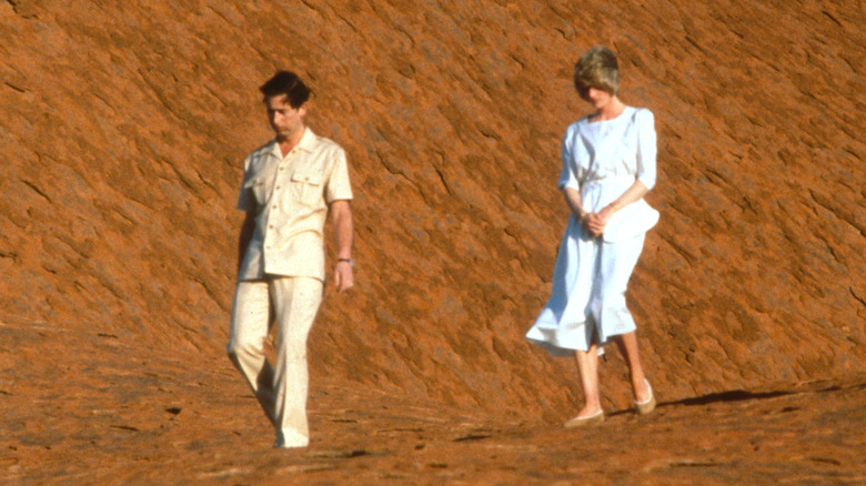 Charles and Diana walk through the Australian Outback