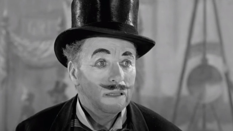 Charlie Chaplin in makeup top-hat