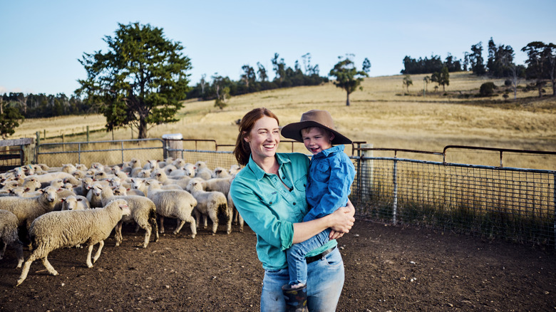 woman and child on a sheep farm in Australia