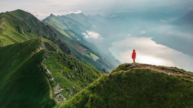 person landscape Swiss mountain range