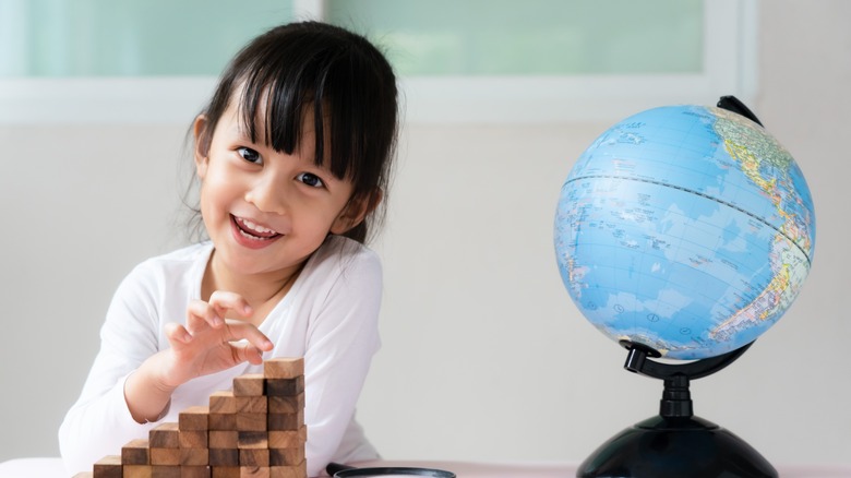 child and globe