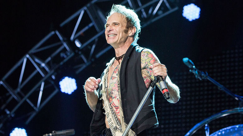 David Lee Roth smiling mic concert stage