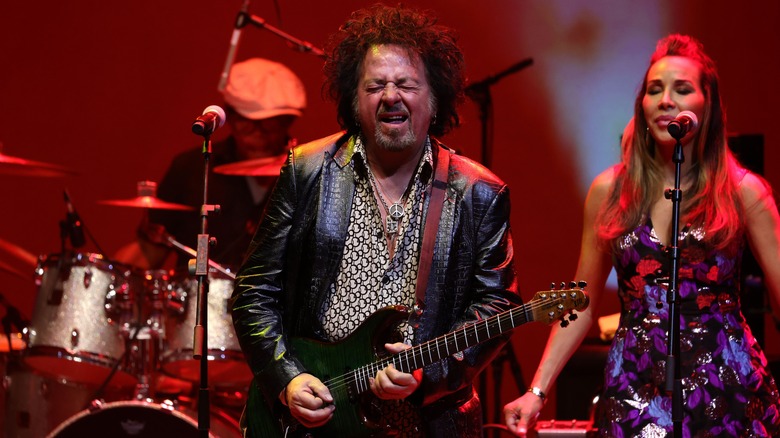 Steve Lukather eyes closed playing guitar live