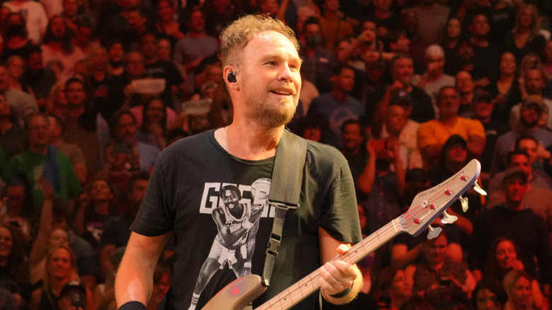 Jeff Ament playing bass onstage