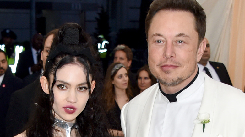 Grimes, Elon Musk smiling