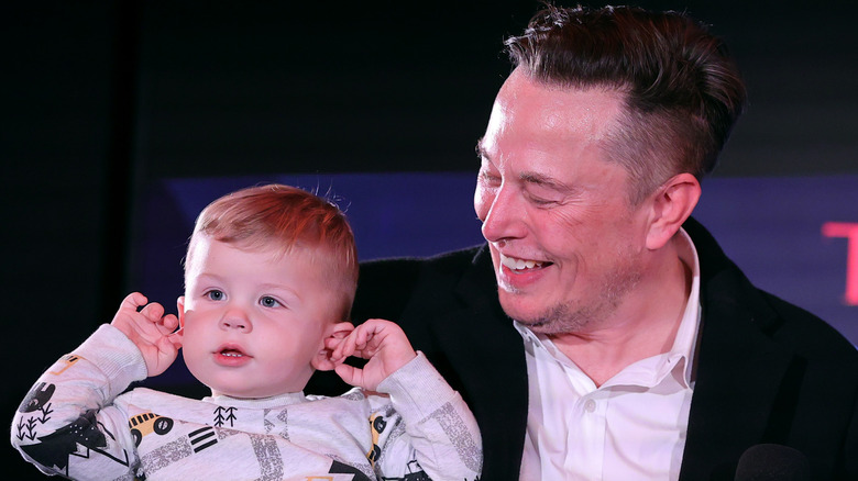 Elon Musk with his youngest child