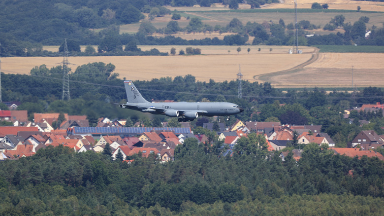 a plane landing at an air base