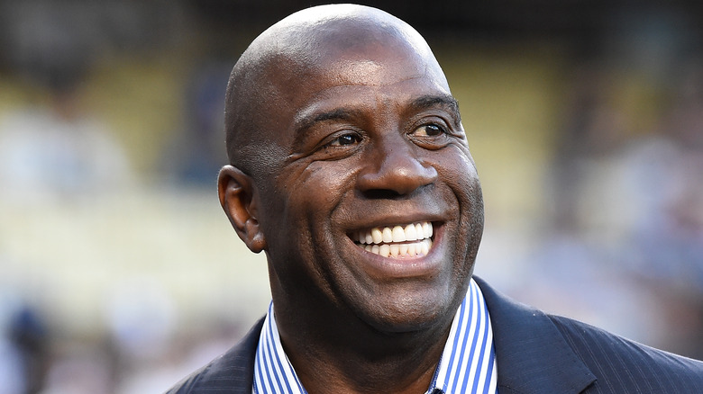 Magic Johnson smiling at a Los Angeles Dodgers game