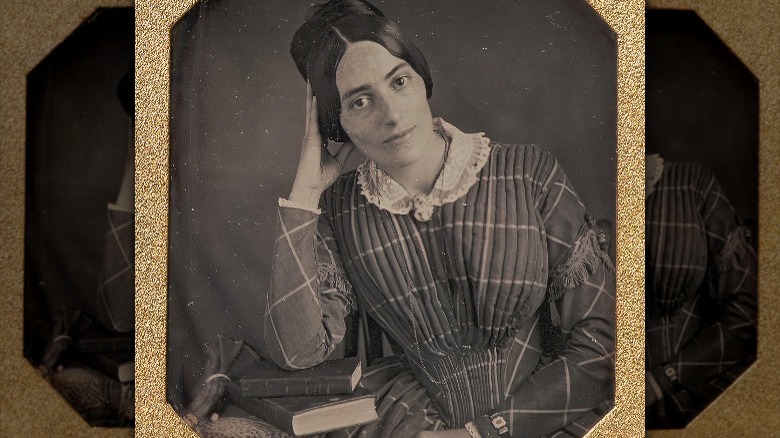 1840s woman with a pile of books