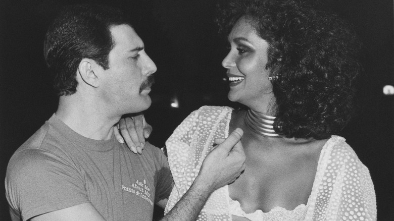 freddie mercury with a woman