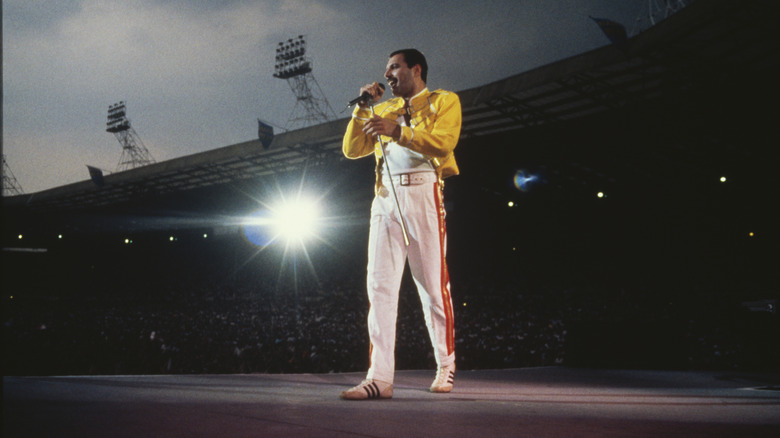 freddie mercury performing on stage