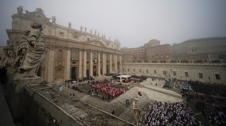 Crowds outside St. Peter's Basilica overcast