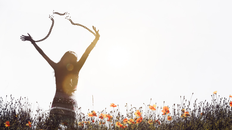 Woman breaking her chains 