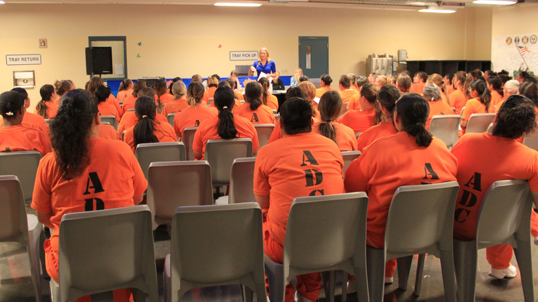 women wearing orange in prison 