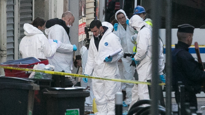 french forensic police investigating st Denis suspect hideout terror cell