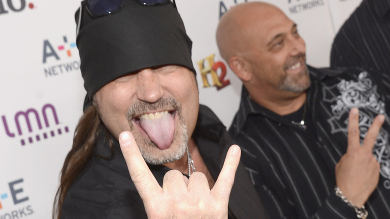 Danny Koker makes devil horns