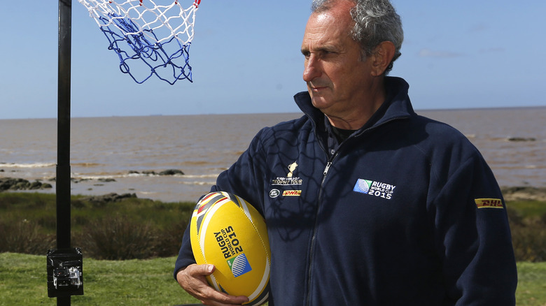 Gustavo Zerbino holding a rugby ball