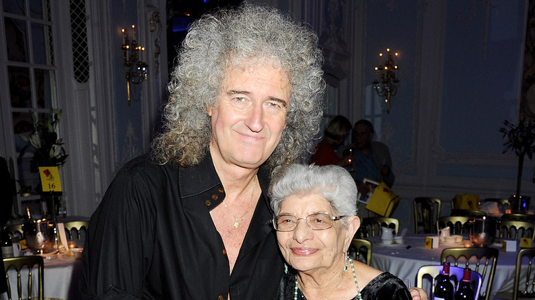 Brian May hugs Jer Bulsara