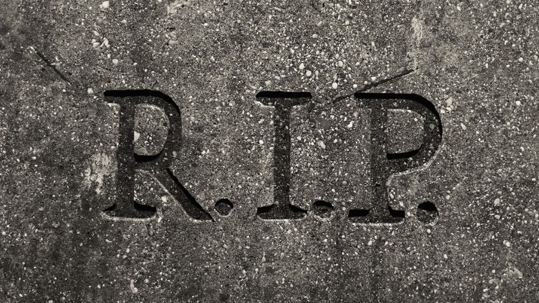 tombstone etched with RIP